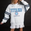 TENNESSEE TITANS STADIUM STRIPES VARSITY STRIPE SLEEVE CREWNECK SWEATSHIRT 20 TENNESSEE TITANS STADIUM STRIPES VARSITY STRIPE SLEEVE CREWNECK SWEATSHIRT